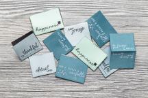 Set di Design di etichette tessute 'happiness colored' by Unikati - Cod. art. 9117